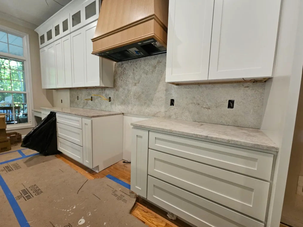 White Shaker cabinetry and hood during Hillsborough kitchen remodel